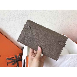 Hermes Kelly Classic Long Wallet In Etoupe Clemence Leather