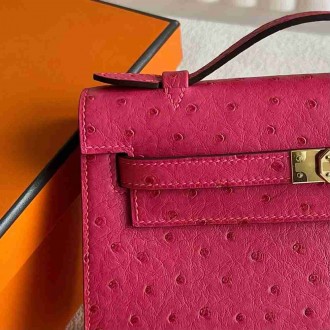 Hermes Kelly Pochette Handmade Bag in Rose Tyrien Ostrich Leather