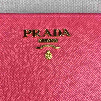 Prada Zipped Wallet In Pink Saffiano Leather