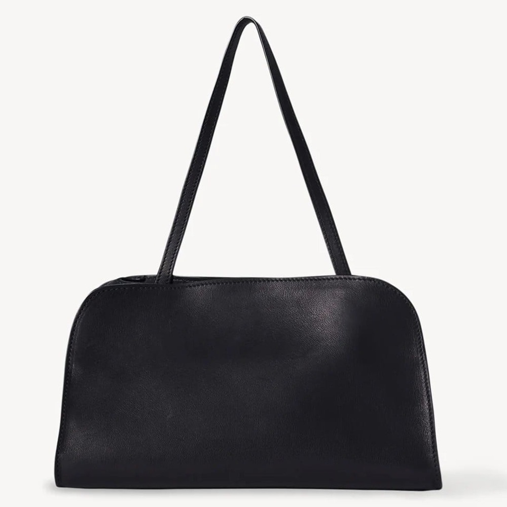 The Row Peggy Clutch in Black Calfskin